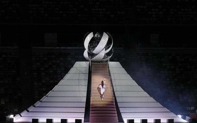 Tokyo Olympics begin with muted ceremony and empty stadium
